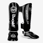 Protège tibias de boxe - noir avec inscription Boom blanche Gingpai - Vignette | SacDeFrappe.fr