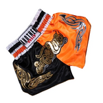 Short boxe thai noir et orange avec inscriptions dorées Anotherboxer - Vignette | SacDeFrappe.fr