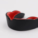 Protège dents boxe rouge et noir Warrior First - Vignette | SacDeFrappe.fr