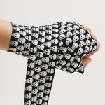 Bandage boxe 3 ou 5 mètres noir avec crânes blancs Anotherboxer - Vignette | SacDeFrappe.fr