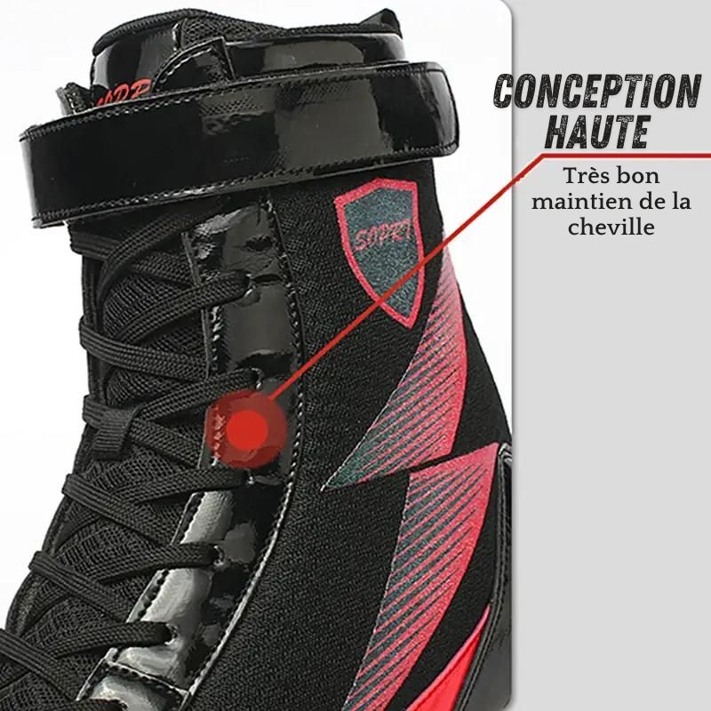 Chaussure de boxe noire et rouge avec conception haute pour un excellent maintien de la cheville.