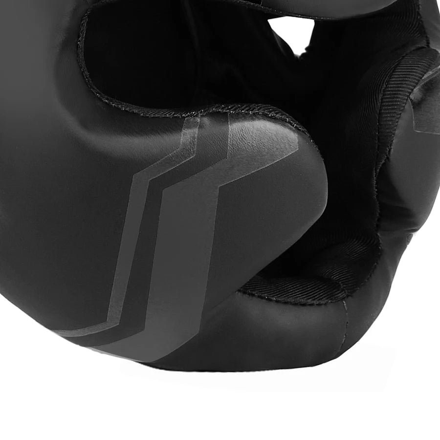 Détail du rembourrage de la mâchoire du casque de boxe GINGPAI noir